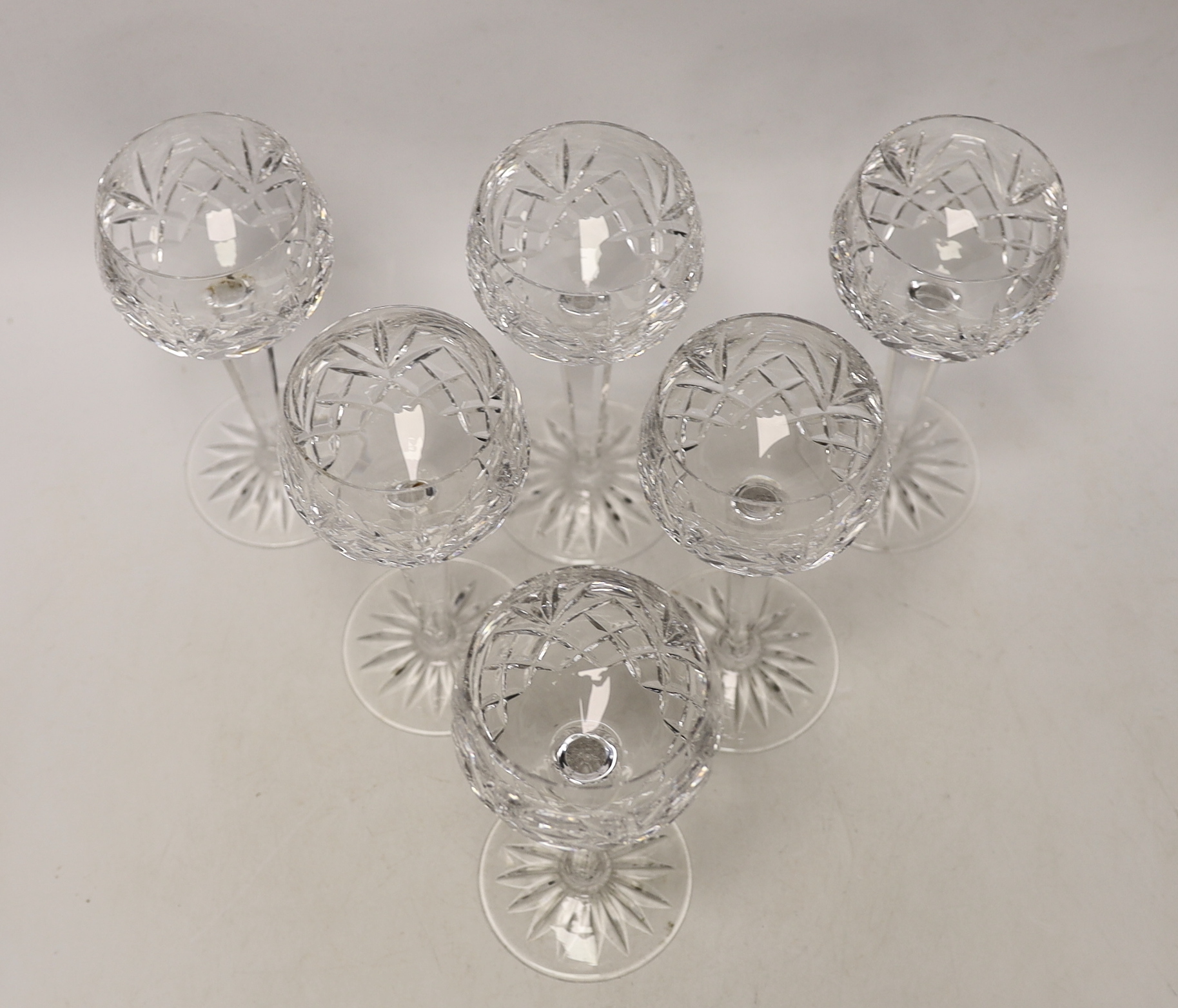 Six cut glass drinking glasses, 18cm high
